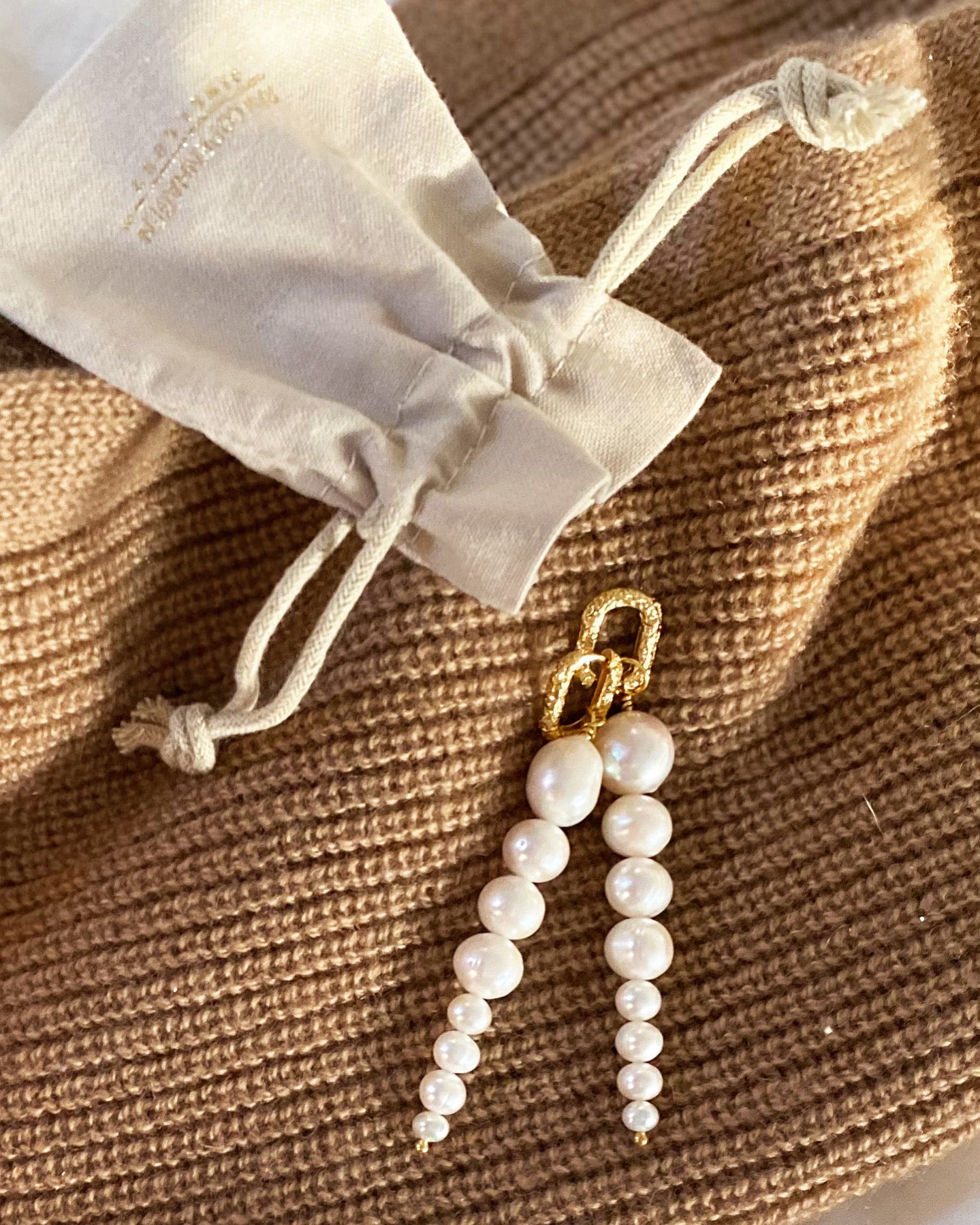 Long Graduated Pearl Earrings from RAW Copenhagen made in Tunbridge Wells Kent UK