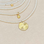 A selection of some of  RAW Copenhagen delicate pearl necklaces with and without pendant