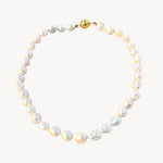 Stunning baroque pearl necklace with round gold clasp