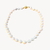 Stunning baroque pearl necklace with round gold clasp