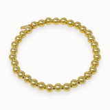 Gold filled beaded bracelet on white background
