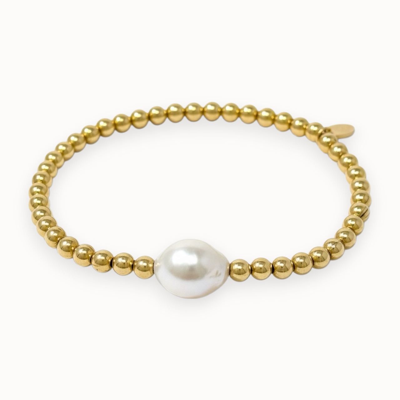 gold filled bracelet with single big baroque pearl