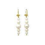 Pair of pearl earrings with gold hooks on a white background