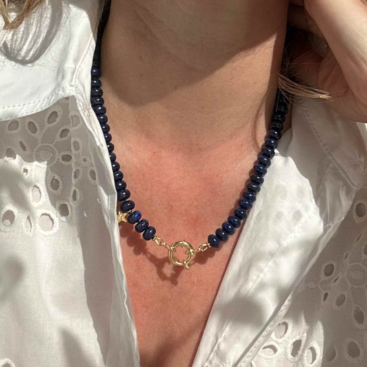 Lapis Lazuli necklace beaded modelled against a white dress