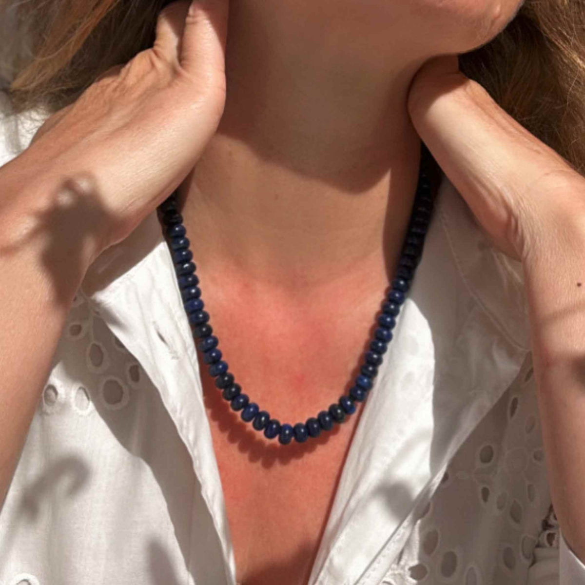 Lapis Lazuli necklace beaded modelled on sun kissed skin