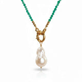 Necklace with green beads and a pearl pendant on a white background