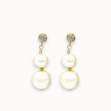 Pair of pearl earrings with gold accents on a white background