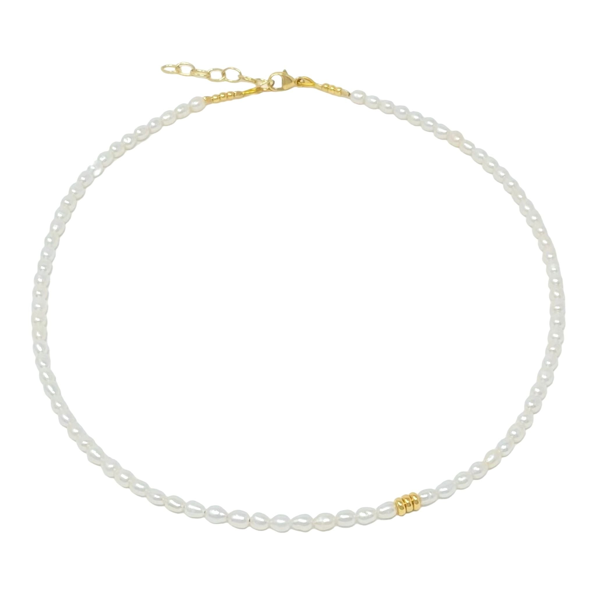 Classic-delicate-seed-pearl-necklace-with-a-modern-twist,-with-oval-shaped-cultured-freshwater-pearls-with-the-most-beautiful-lustre-and-god-vermeil-sterling-silver-beads.-Handmade-in-Kent-UK