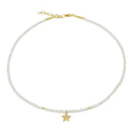 Bestselling delicate pearl choker from RAW Copenhagen, the boho shine pearl choker with cure handmade star pendant in gold vermeil