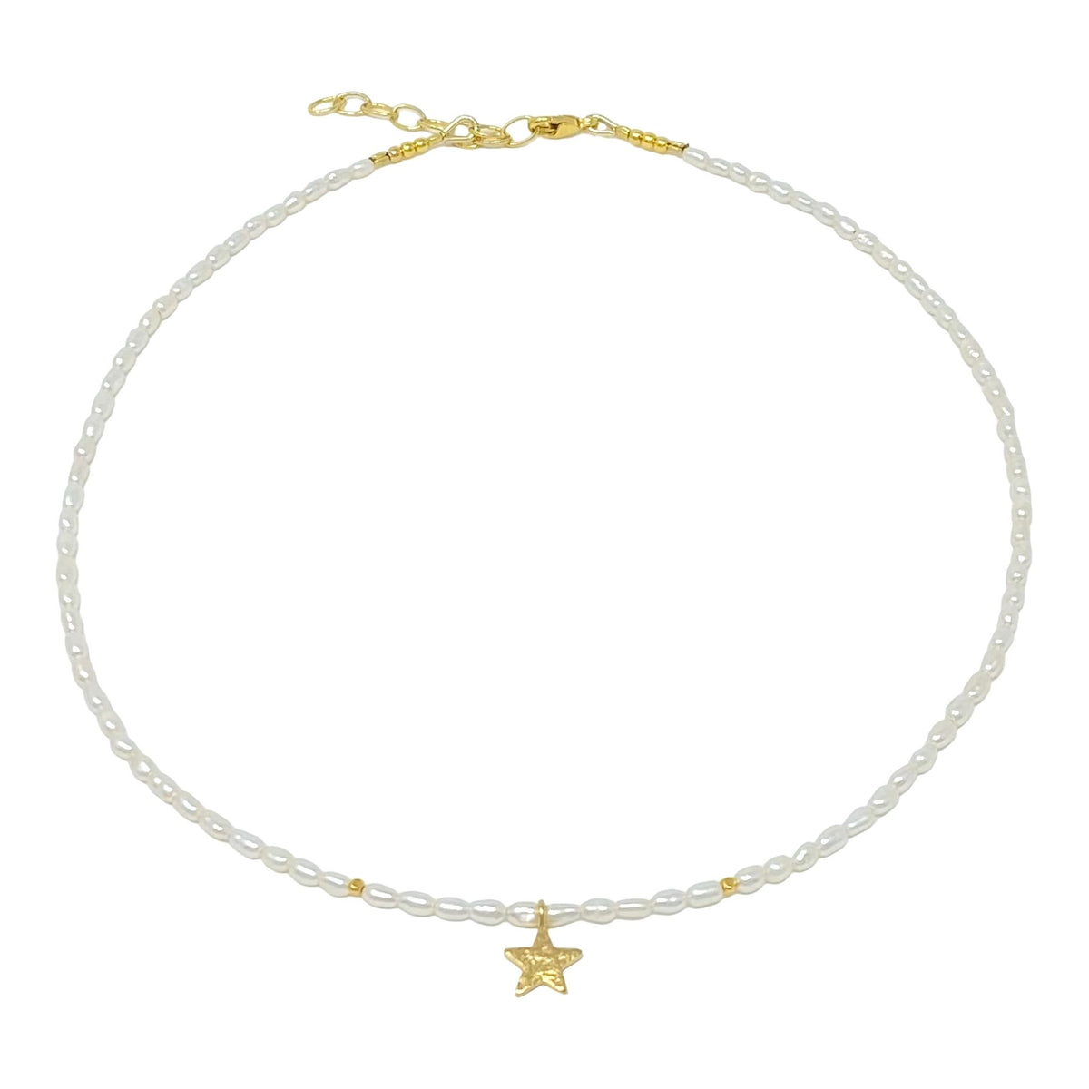 Bestselling delicate pearl choker from RAW Copenhagen, the boho shine pearl choker with cure handmade star pendant in gold vermeil