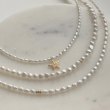 Classic-delicate-seed-pearl-necklaces-with-a-modern-twist,-with-oval-shaped-cultured-freshwater-pearls-with-the-most-beautiful-lustre-and-god-vermeil-sterling-silver-beads.-Handmade-in-Kent-UK