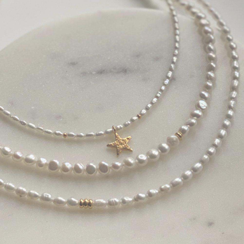 Classic-delicate-seed-pearl-necklaces-with-a-modern-twist,-with-oval-shaped-cultured-freshwater-pearls-with-the-most-beautiful-lustre-and-god-vermeil-sterling-silver-beads.-Handmade-in-Kent-UK